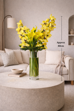 Large yellow orchid arrangement approximately 90 cm tall in modern contemporary interior, Montreal luxury florist styling
