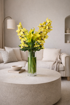 yellow callas lilies and yell0w orchids in a vase for a nice delivery in Montreal