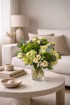 Green hydrangea and lisianthus floral arrangement styled in a contemporary interior by a Montreal florist
