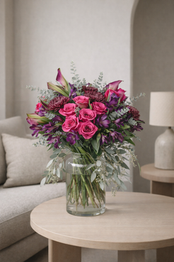 Luxury pink and purple flower bouquet styled in modern contemporary living room, Montreal floral design.