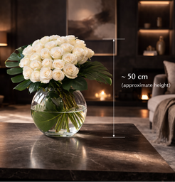 Luxury white roses bouquet approximately 50 cm high in clear glass vase, contemporary dark interior setting, Montreal flower delivery
