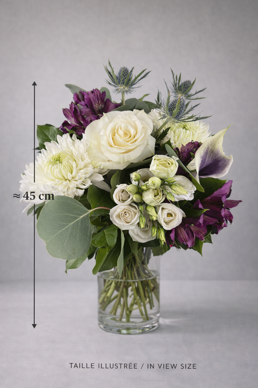 Luxury white and purple bouquet in vase approximately 45 cm tall by a Montreal florist
